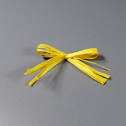 Dekoschleife Baumwollbast - Flügelschleife gelb mit Clip