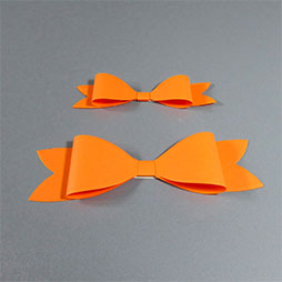 Papierschleifen orange - Schwalbenform, Klebepunkt